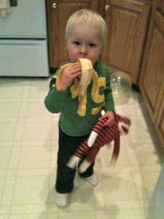 Noah and Monkey eating a banana